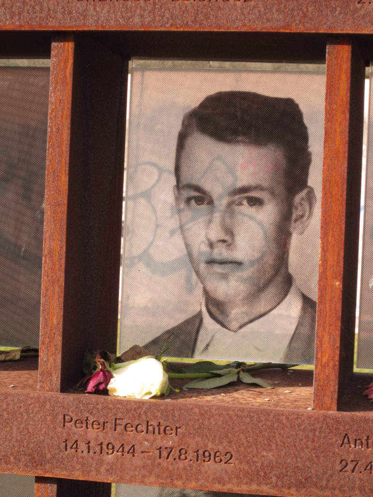 Fechter was shot in the pelvis while climbing the Wall in plain view of hundreds of witnesses. He fell back into the death-strip on the East German side, where he remained in view of West German onlookers, including journalists. Despite his screams, Fechter received no medical assistance from the East German side, and could not be tended to by those on the West side. West Berlin police threw him bandages, which he could not reach, and he bled to death after approximately one hour.